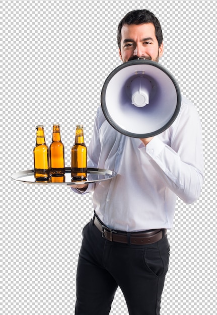 Waiter with beer bottles on the tray shouting by megaphone