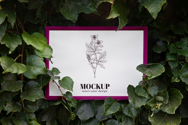 PSD wall frame mock-up design with leaves and vegetation