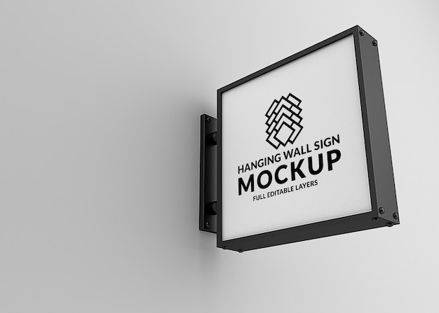 Mockup di segno appeso a parete isolato