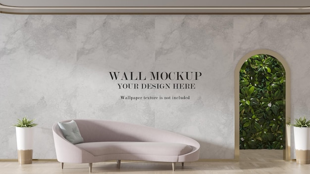 PSD wall mockup behind pale pink sofa