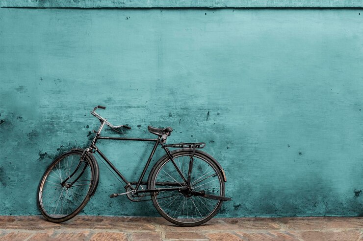 PSD wall mockup with bicycle at front psd