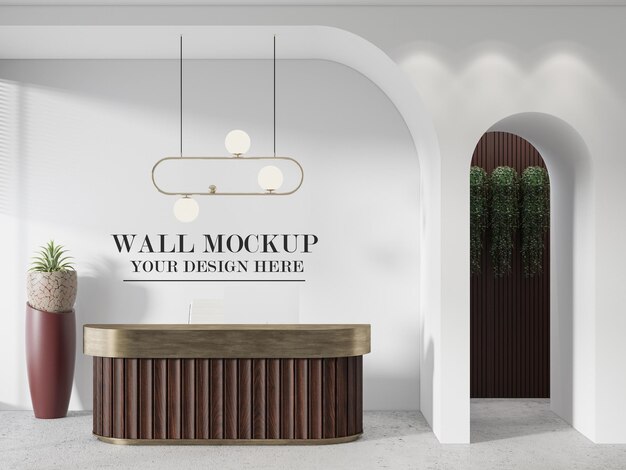 PSD wall mockup behind wooden reception desk