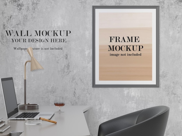 Wall and picture frame mockup beside computer table