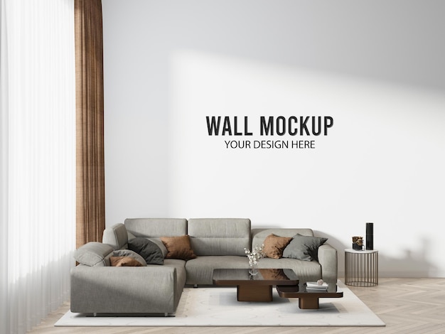 Un muro con un muro di divani grigi e un cartello bianco che dice muro il tuo design.