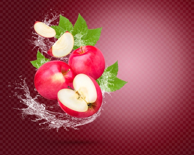 Water splash on fresh red apple with leaves isolated on red background premium psd