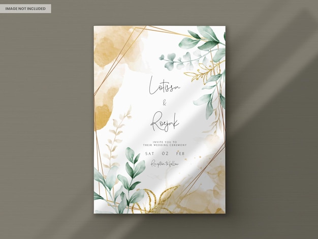 Watercolor wedding invitation card in elegant green leaves