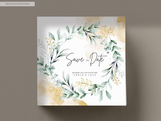 PSD watercolor wedding invitation card in green leaves and gold ornament