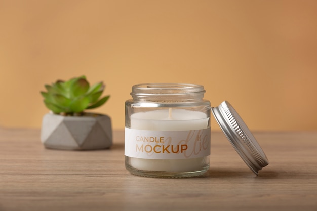 PSD wax candle in glass jar with label mock-up