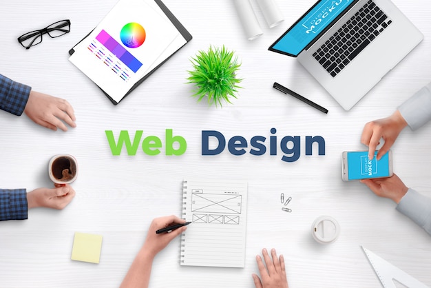 Web design studio office desk scene generator with isolated layers and objects. Web design text surrounded with hands, office supplies and devices.