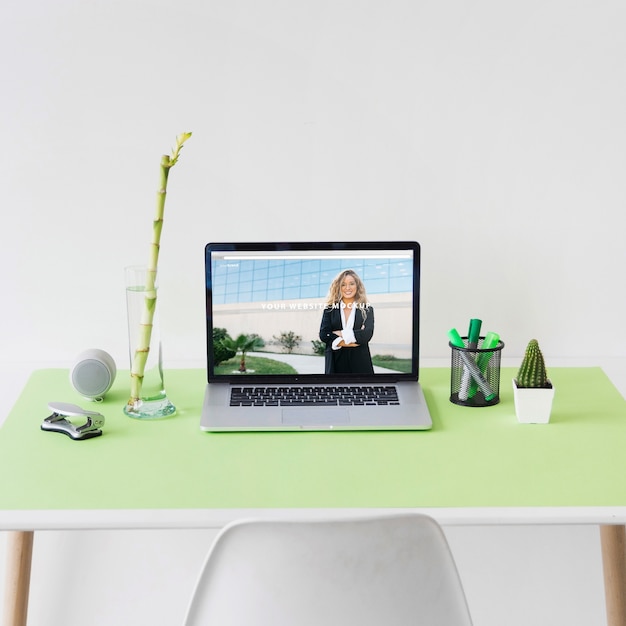 PSD website mockup with laptop on desk