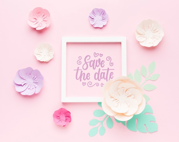 PSD wedding frame mock-up with paper flowers on pink background