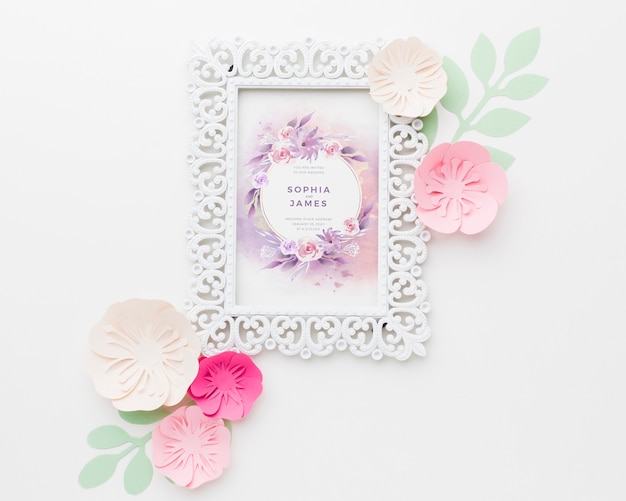 Wedding frame mock-up with paper flowers on white background