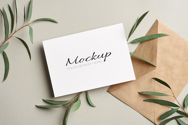 Wedding invitation card mockup with envelope and eucalyptus twigs