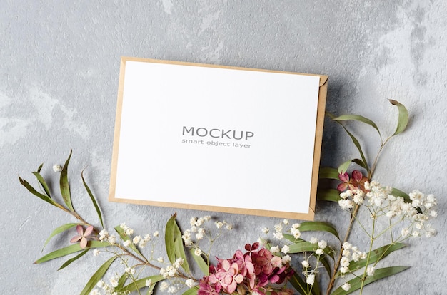 Wedding invitation card mockup with flowers
