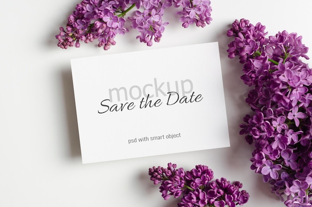 Wedding invitation card mockup with spring lilac flowers