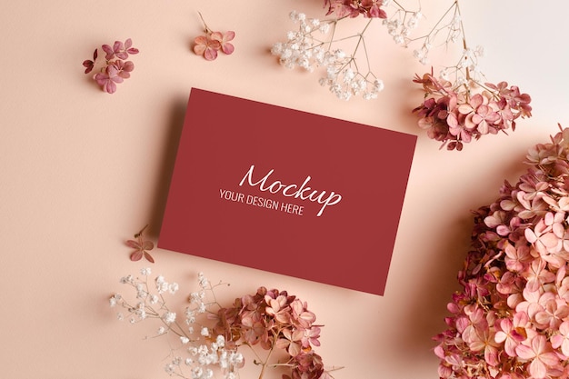 Wedding invitation or greeting card mockup with pink hydrangea flowers