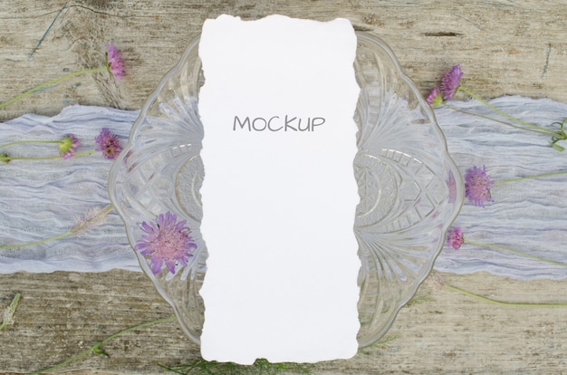 Wedding mockup menu with pink flowers on violet runner and old wood wood