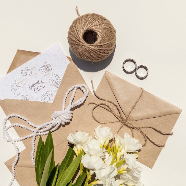 Wedding paper envelope with flowers and rings