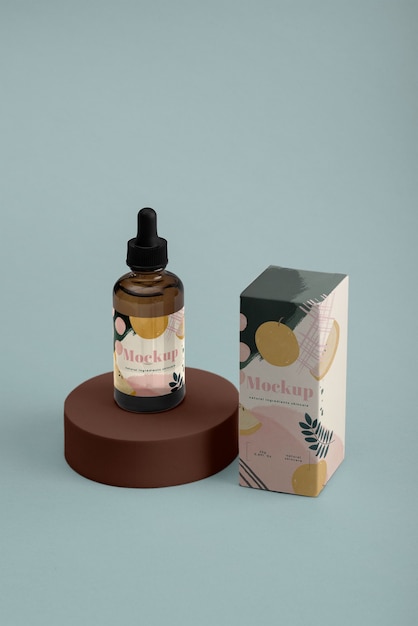 PSD weergave van cosmetisch product in druppelflesje met mock-up verpakking