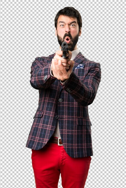 well dressed man shooting with a pistol