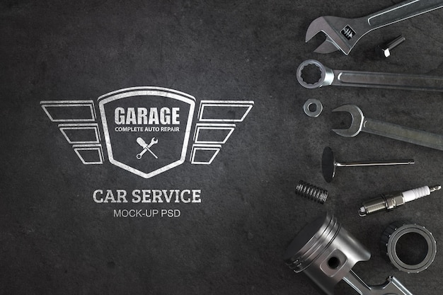 Werkgereedschap van bovenaanzicht met mockup met autoservice-logo