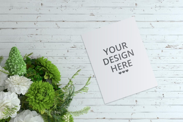 PSD white blank paper on wooden table mock up