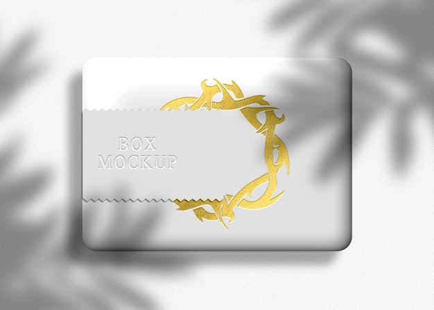 White box with gold embossed box sealed mockup