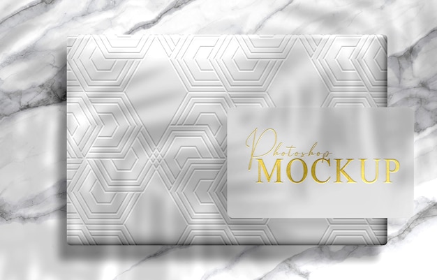 White box with gold embossed business card mockup