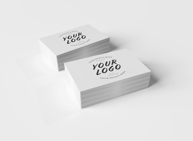 PSD white business card stack on white surface