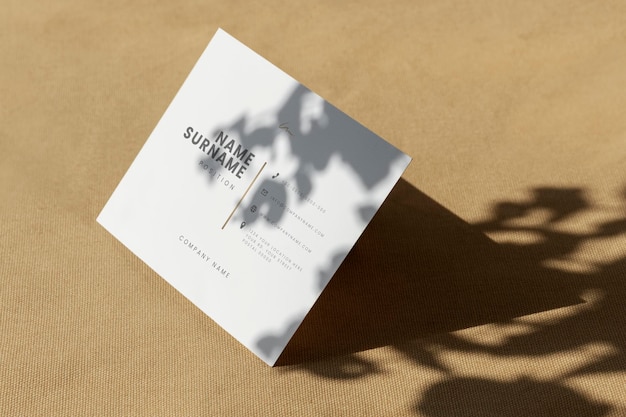 white business card template on a brown textile
