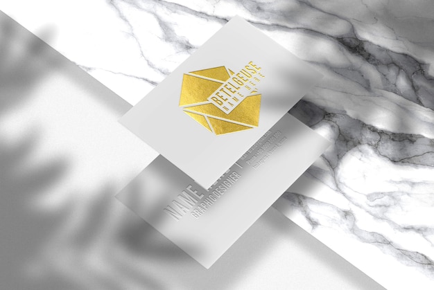 white business card with gold embossed