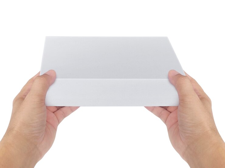 PSD white cardboard box in hand transparent background