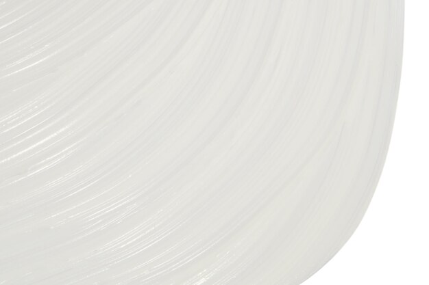 PSD crema cosmetica bianca spalmata su uno sfondo bianco