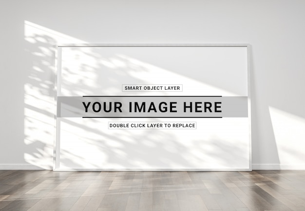 White frame leaning in interior mockup