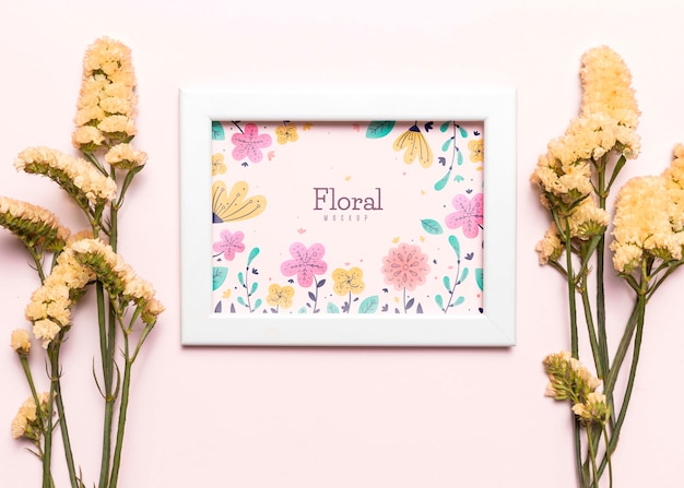 PSD white frame with flowers arrangement