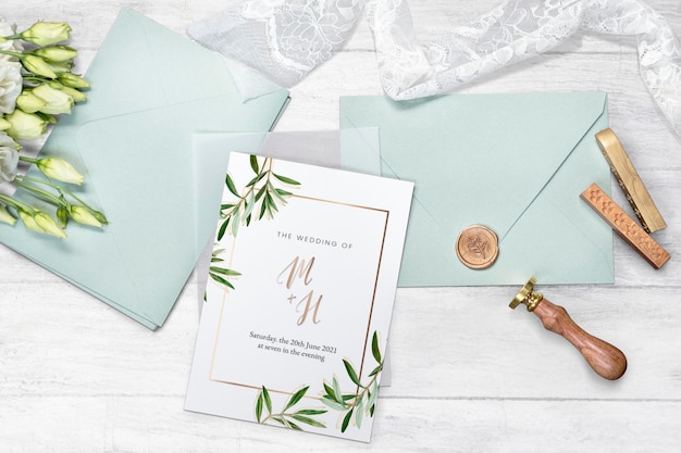 white lisianthus with a wedding invitation card mockup