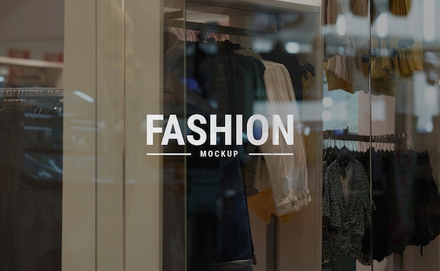 White logo mockup on glass fashion fashion at shopping mall