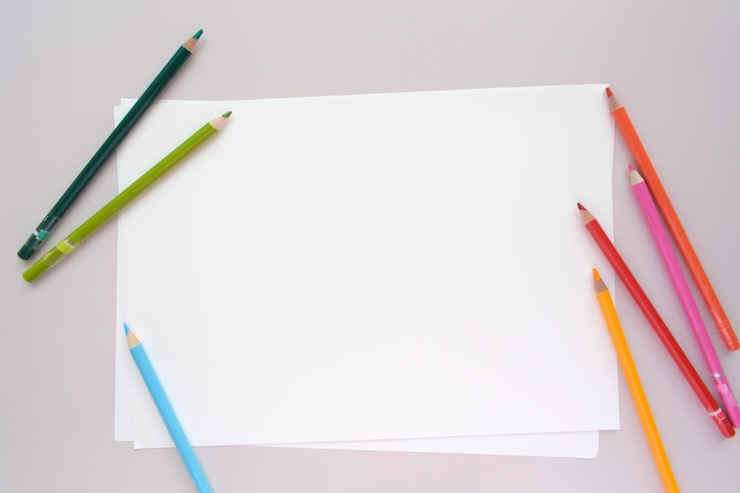 PSD white paper and pencils sketchbook landscape mock up