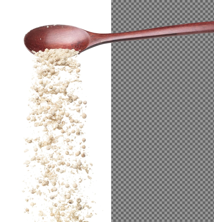 PSD white pepper seeds fall down pour in wooden spoon white pepper mix powder float explode abstract cloud fly peppercorn mix powder splash throwing in air white background isolated high speed shutter