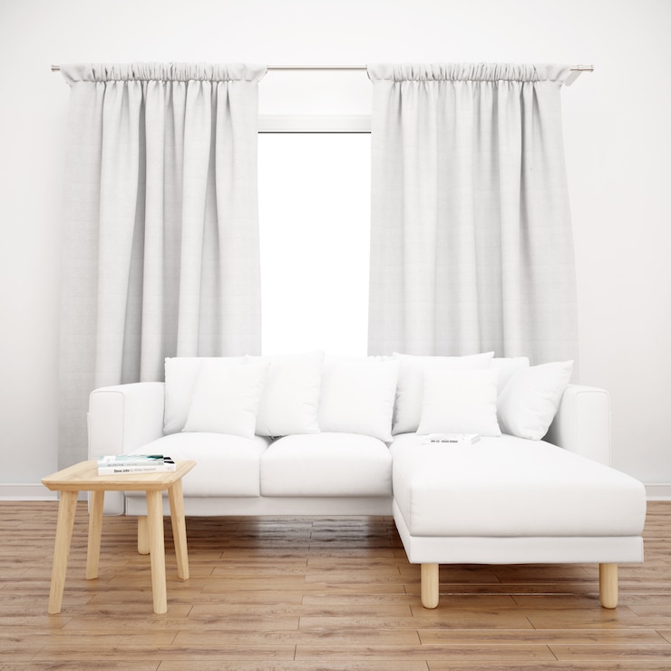 PSD white sofa under a window