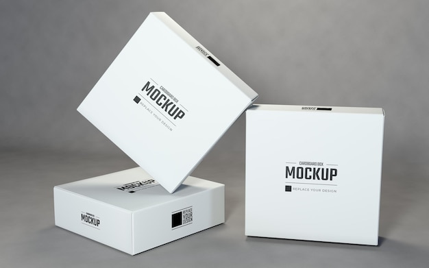 PSD white square cardboard boxes mockup design with gray background