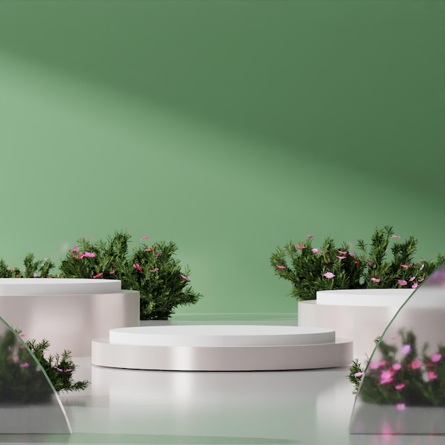 A white table with a green wall and a white vase with pink flowers on it.