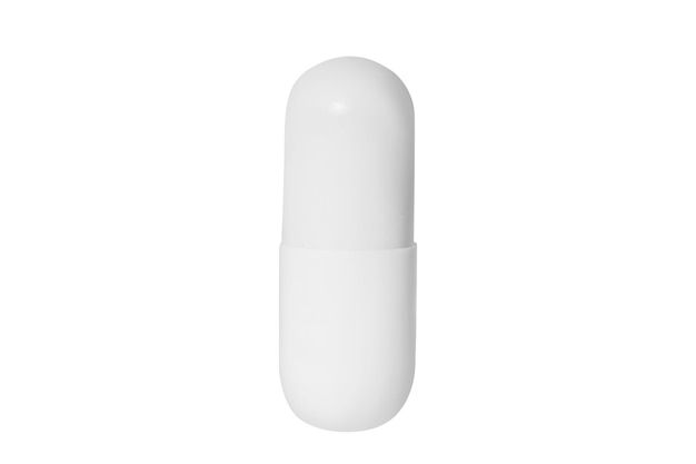 White tablet or capsule isolated close up