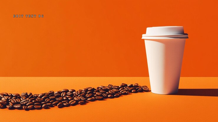 White takeaway coffee cup beside scattered coffee beans on orange background
