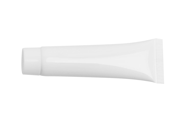 PSD white tube of cream on empty background