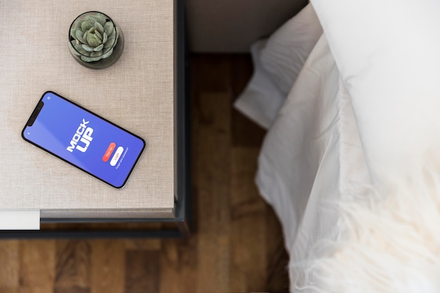 Widok z góry na telefon komórkowy z koncepcją makiety