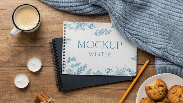 Winter hygge arrangement with notepad mock-up