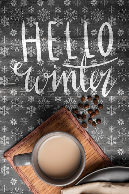 Winter message and hot coffee beside