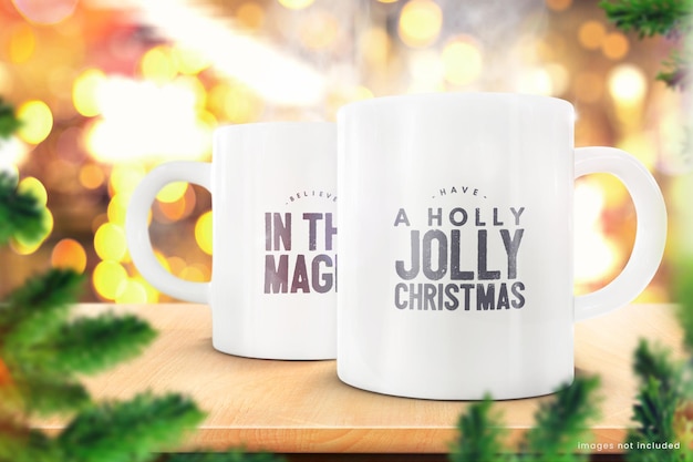 Winter mug mockup of two blank white coffee cups on Christmas Background