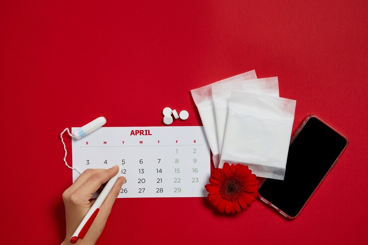 PSD wkładki menstruacyjne i czerwony kwiat